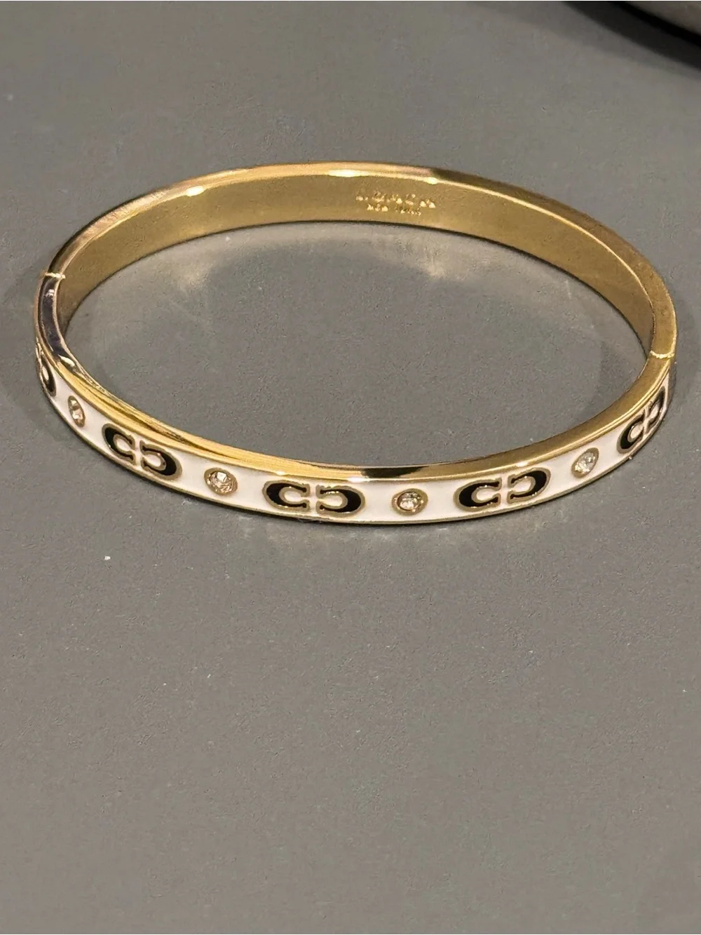 Coach Kissing C Enamel Rhinestone Hinge Bangle Bracelet Gold White NIP